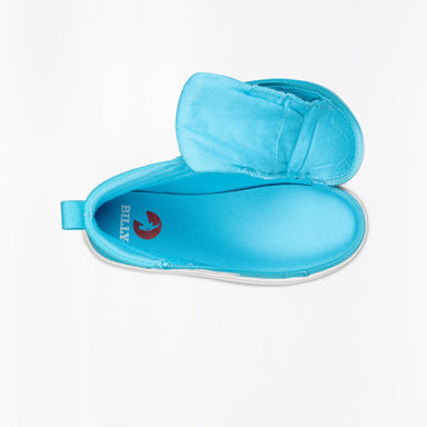 Blue trainer photographed from above. The trainers zipper is unzipped from the ankle and around the toes. Showing full open access to the inside of the shoe